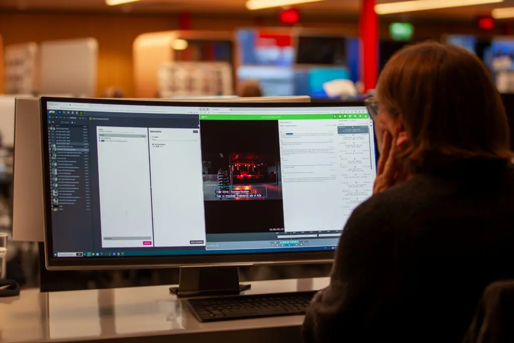 An SVT team member using the Limecraft plugin to create subtitles within the native production environment.